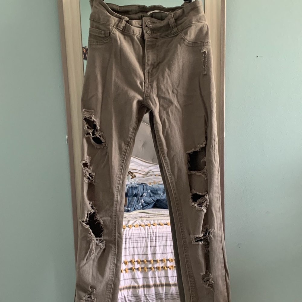 Army green ripped jeans